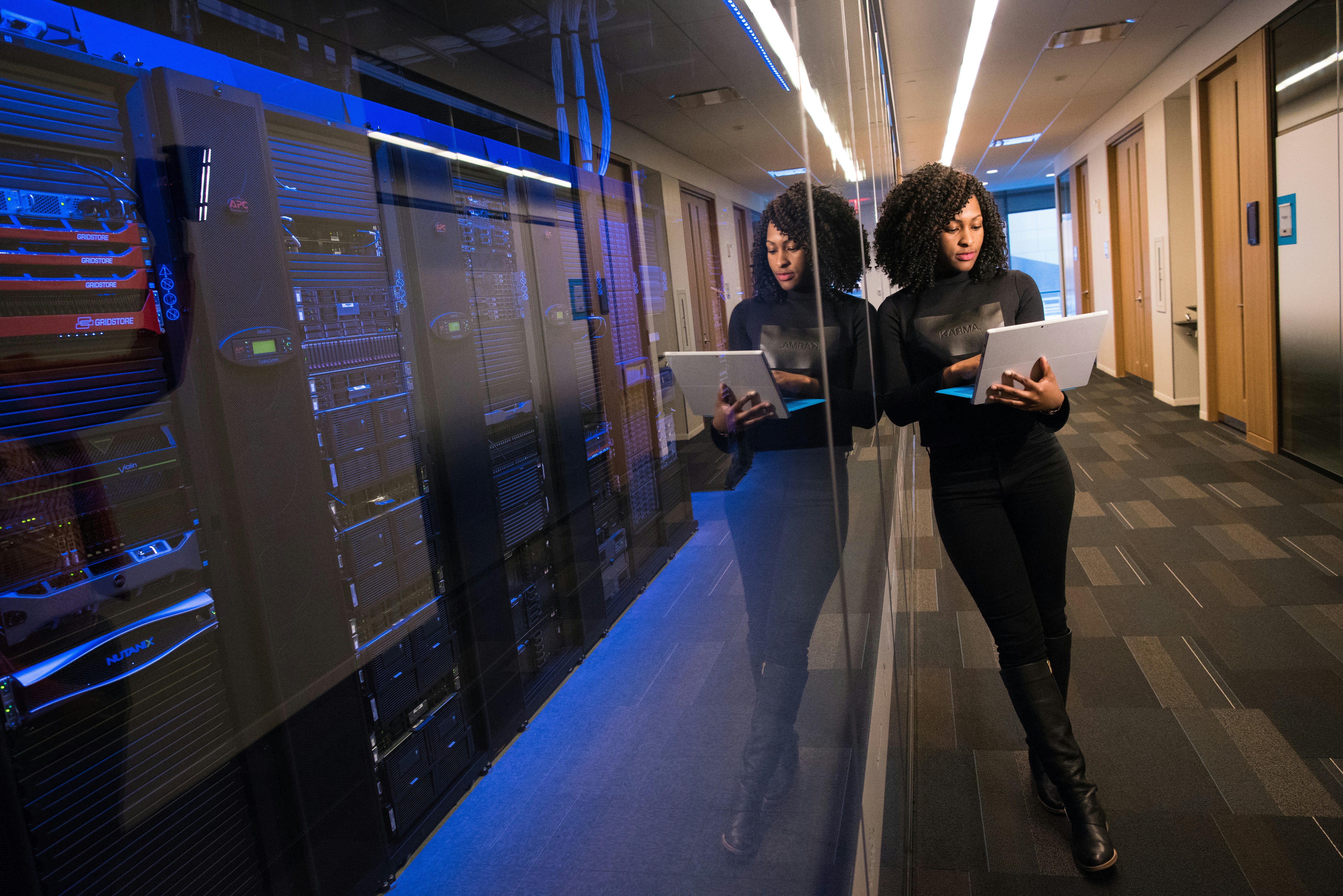 A woman using a Surface laptop